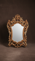 Baroque walnut and gold-leaf mirror